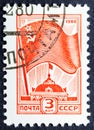 Soviet union flag over Moscow Kremlin in vintage stamp Royalty Free Stock Photo