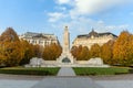 Soviet War Memorial featuring a white stone obelisk in an autumn park in Budapest's Liberty square