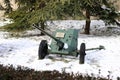 Soviet World War II Anti-tank gun on the snow in museum during the winter.