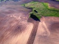 Sowed cultivated spring agriculture field, aerial view