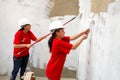 Diverse Community members building a low cost house in Soweto