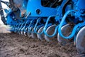 Sowing campaign in the field in early spring. Tractor with seeder