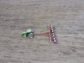 Sowing of corn. Tractor with a seeder on the field. Using a seeder for planting corn.