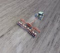 Sowing of corn. Tractor with a seeder on the field. Using a seeder for planting corn.