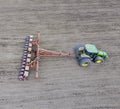 Sowing of corn. Tractor with a seeder on the field. Using a seed