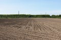 Sowing time, plowed land, rows of plowed land prepared for sowing Royalty Free Stock Photo