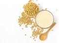 Soy bean milk and soy beans top view on white background Royalty Free Stock Photo