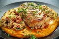 Soy-glazed cod loin fillet with cous-cous salad on butternut squash puree Royalty Free Stock Photo
