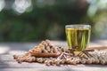 Healthy soybean on wooden floor, wooden cup, wooden spoon together as a group, copy space