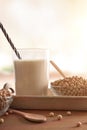 Soy milk and grains in white kitchen front