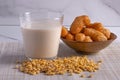 Soy milk and soy pellets with "patongko" thai and chinese deep fried twin stick on light brown background Royalty Free Stock Photo