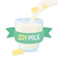 Soy milk with soy beans poured into a clear glass for drinking in the morning. Health care concept