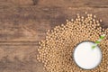 Soy milk on wooden background top view Royalty Free Stock Photo