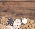 Soy products on wooden background top view