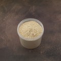 Soy Protein isolate in transparent plastic box. Pure powder