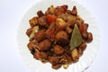 Soya chunks aur Aloo ki sabji. Mealmaker with potato Indian curry. on white background Royalty Free Stock Photo