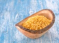 Soybean,Blue wooden bowls on wooden floor.