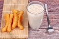 Soybean milk filling jelly ,cereal and grain served with deep-fried dough stick as Patongko