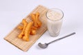 Soybean milk filling jelly ,cereal and grain served with deep-fried dough stick as Patongko