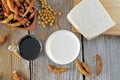 Soybean milk, sauce and tofu on a wooden table