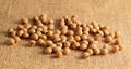 Soybean on the sack background Royalty Free Stock Photo