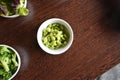 Soybeans in a small white bowl on a wooden table Royalty Free Stock Photo