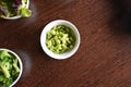 Soybeans in a small white bowl on a wooden table Royalty Free Stock Photo