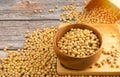 Soybeans in brown wooden bowl