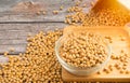 Soybeans in glass bowl with Soybeans pour from bag