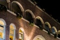 Beautiful arched balcony`s decorated with flowers modern dutch architecture Royalty Free Stock Photo