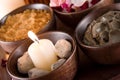 Spa accessories: scented stones, mud, body scrub Royalty Free Stock Photo