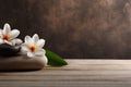 Spa Ambiance with Candle and Orchids Royalty Free Stock Photo