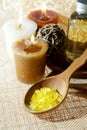 Spa aroma salt in spoon, aroma candles Royalty Free Stock Photo