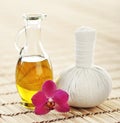 Spa aromatherapy with fragrant oil and a flower Royalty Free Stock Photo