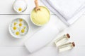 Spa background with bath yellow sea salt, natural cream and chamomile
