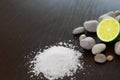 Spa Background. Sea Salt with Lime Stones and Candle . Body scru Royalty Free Stock Photo