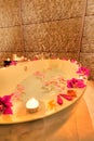 SPA bath with flower petals Royalty Free Stock Photo