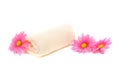 Spa / bath towel and pink daisy flowers