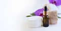 Spa bathe scin care and health still life composition. Essential oil bottle dropper, cream and soap bar over light background Royalty Free Stock Photo