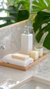 Spa bathroom ambiance with toiletries, soap, and towel on blurred white background