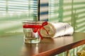 Spa and bauty salon detail - towel and candle holder. Indoor shot. Royalty Free Stock Photo