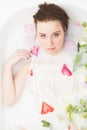 Spa beauty girl bathing in milk bath, spa and skin care concept. Beauty young Woman with perfect slim body and soft skin, in Royalty Free Stock Photo