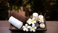 Spa beauty massage healthy wellness background. Spa Thai therapy treatment aromatherapy for body woman with flower Plumeria Royalty Free Stock Photo
