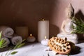 Spa beauty wellness concept with statue of Buddha with burning candles for spa time. Royalty Free Stock Photo