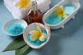 Spa and body care products. Aromatic blue bath Dead Sea Salt on the blue background