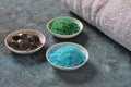Spa and body care products. Colorful aromatic bath Dead Sea Salt and black Dead Sea Mud. Natural ingredients for homemade body Royalty Free Stock Photo