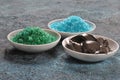 Spa and body care products. Colorful aromatic bath Dead Sea Salt and black Dead Sea Mud. Royalty Free Stock Photo