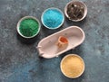 Spa and body care products. Colorful aromatic bath Dead Sea Salt and black Dead Sea Mud. Royalty Free Stock Photo