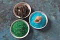 Spa and body care products. Colorful aromatic bath Dead Sea Salt and black Dead Sea Mud. Royalty Free Stock Photo