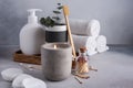 Spa composition with aromatic candle, towels and other bathroom accessories Royalty Free Stock Photo